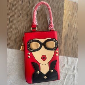 Red Wristlet wallet with abstract woman’s face